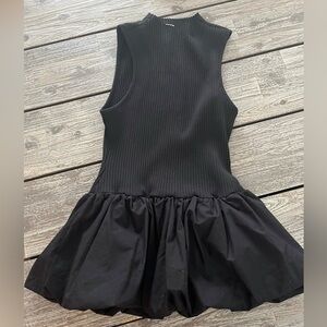 MAEVE black knit top with bubble peplum, size L.